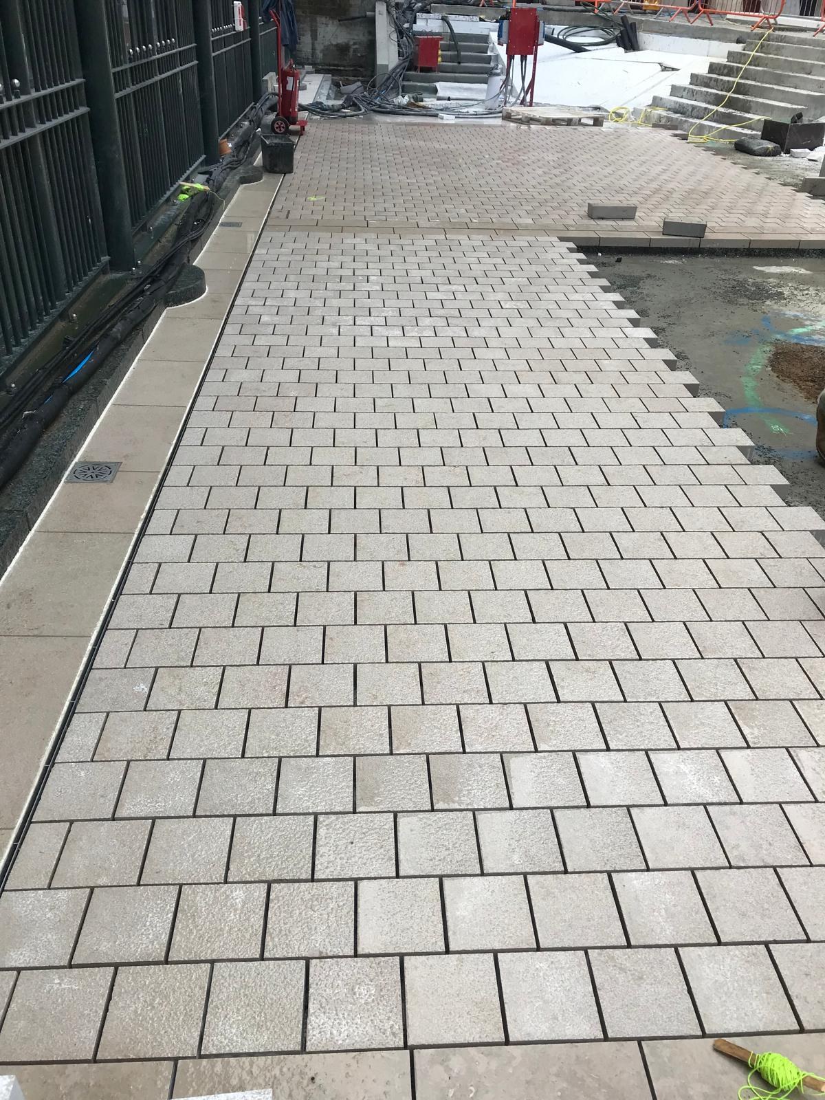 Natural stone paving being laid